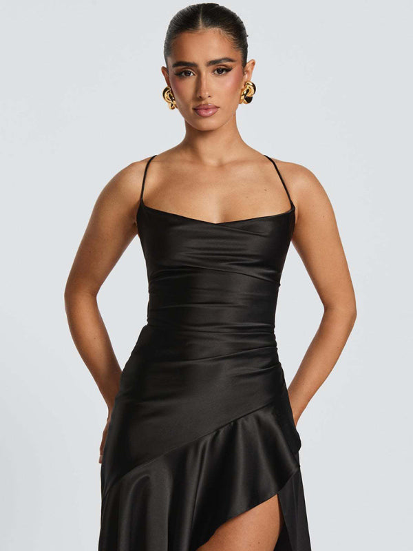 Halter dress with a ruffled, irregular hem.
